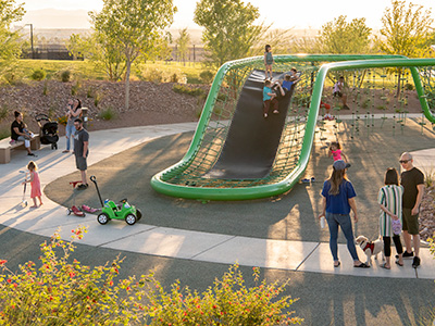 Children and families enjoying an afternoon at the playground