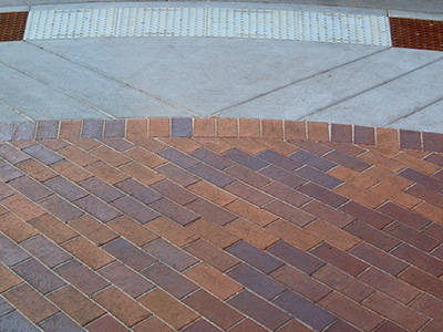 Artistic paving pattern with brick and concrete