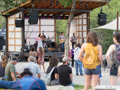 People gathering to hear live music at the park