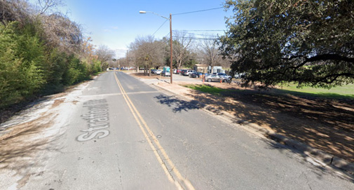 View looking down Stratford Drive, showing lack of sidewalks